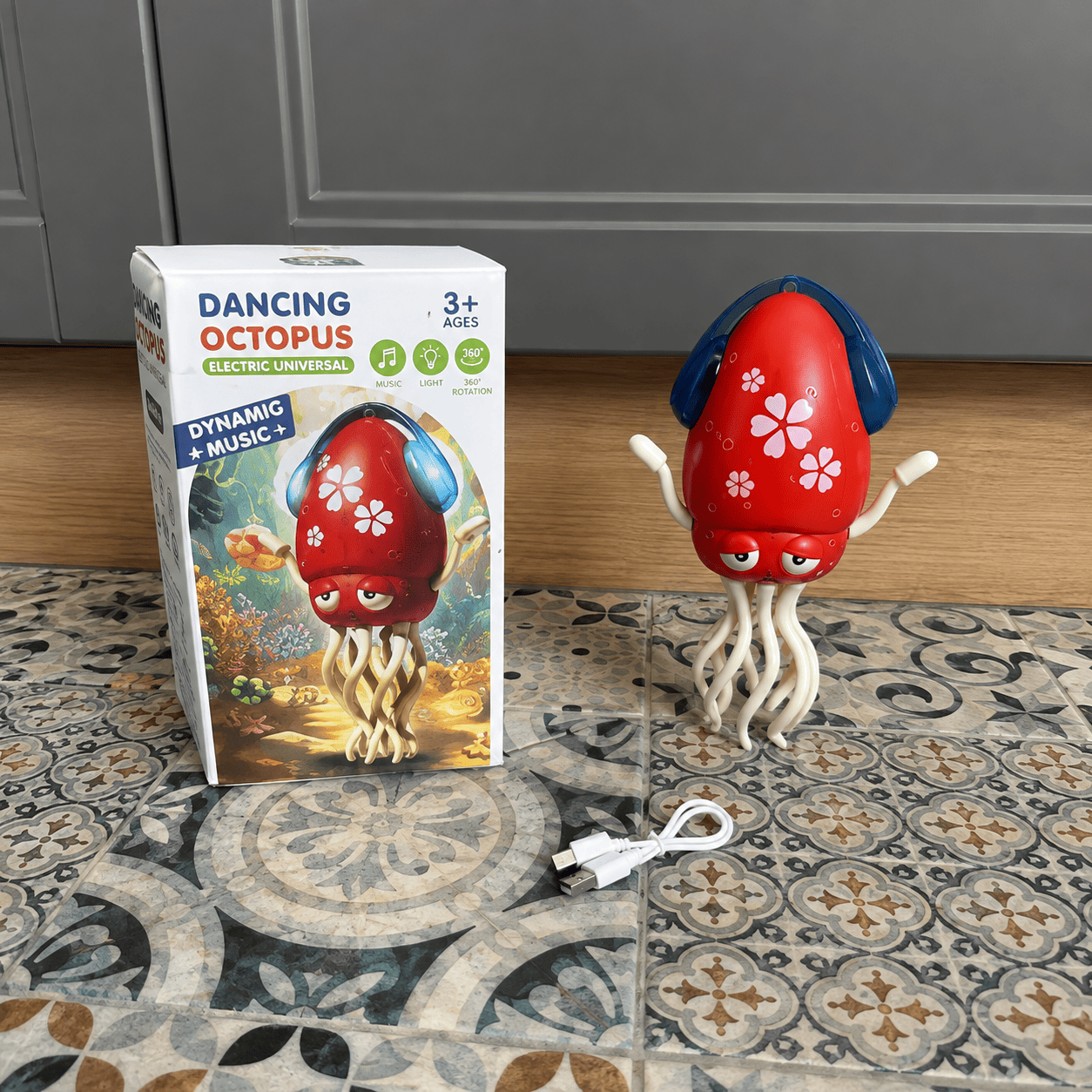 Interaktivna Dancing Octopus igračka u obliku hobotnice koja se kreće i igra, zabavan poklon za mališane i ljubitelje neobičnih igračaka.